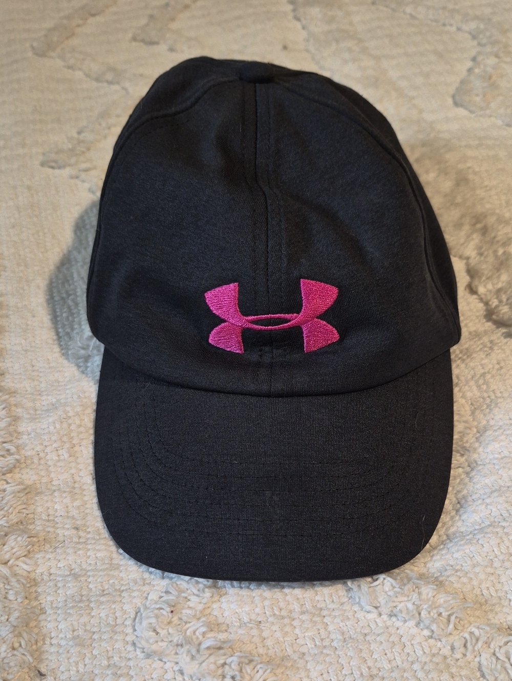 NWOT. Under Armour Black Hat with Pink Logo Women's